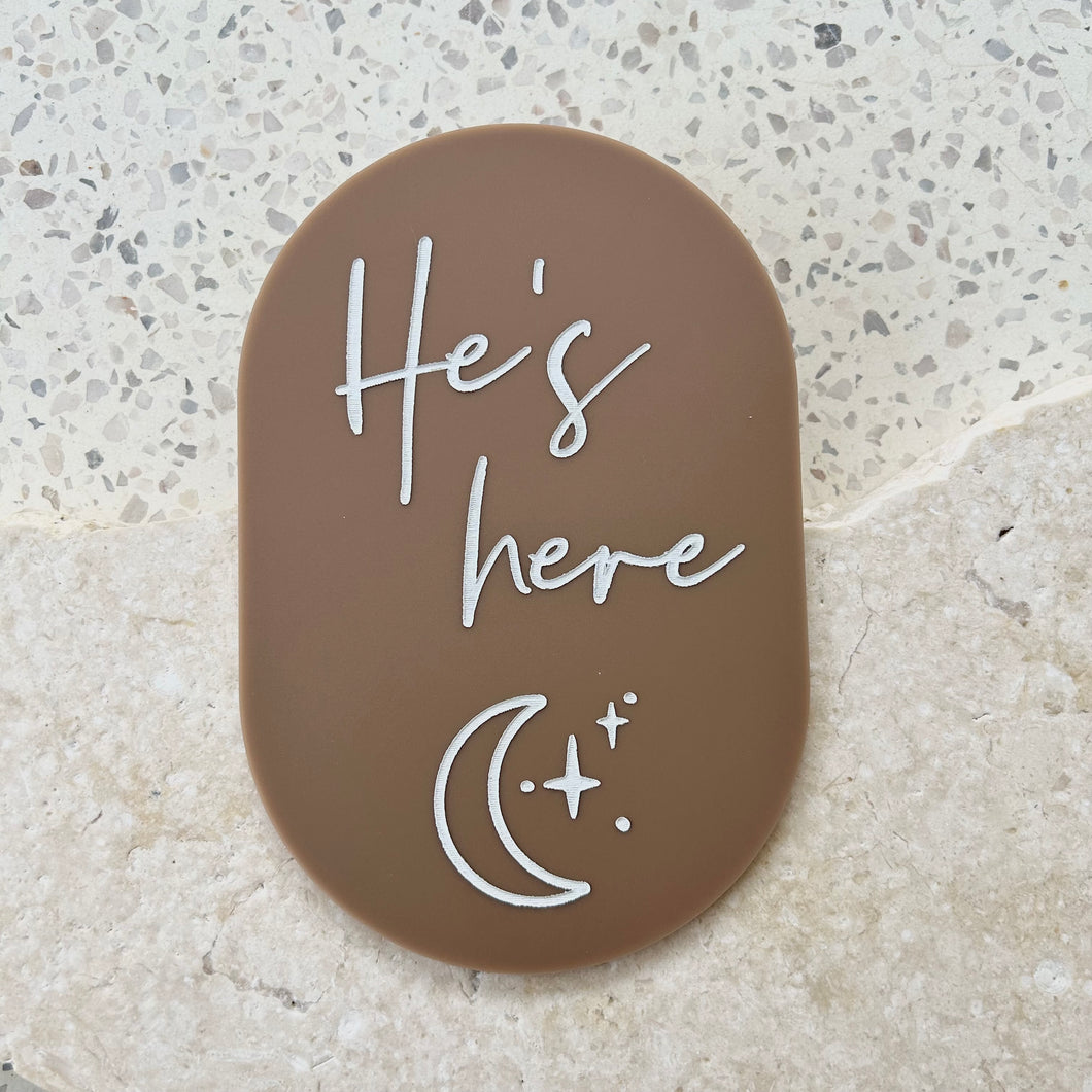 He’s here plaque