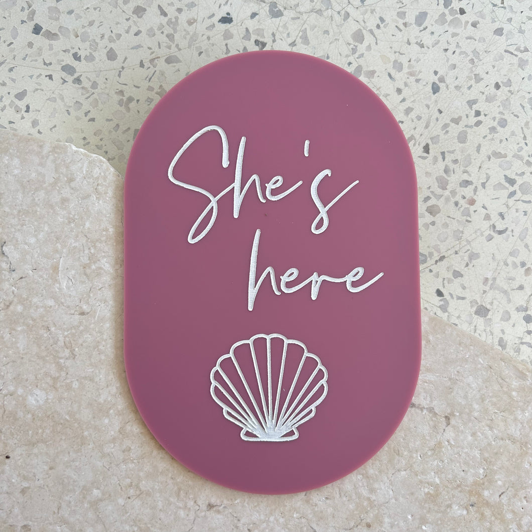 She's here - Shell plaque