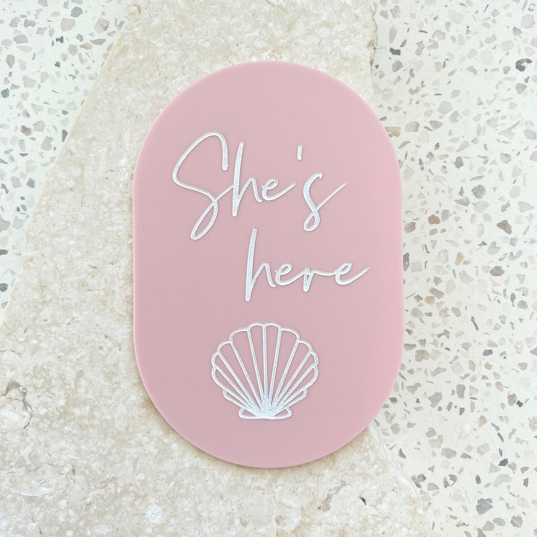 She's here - Shell plaque